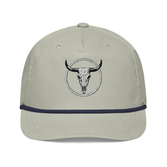 Mntain Outlaw golf rope cap in beige with black bull skull logo and navy rope detail