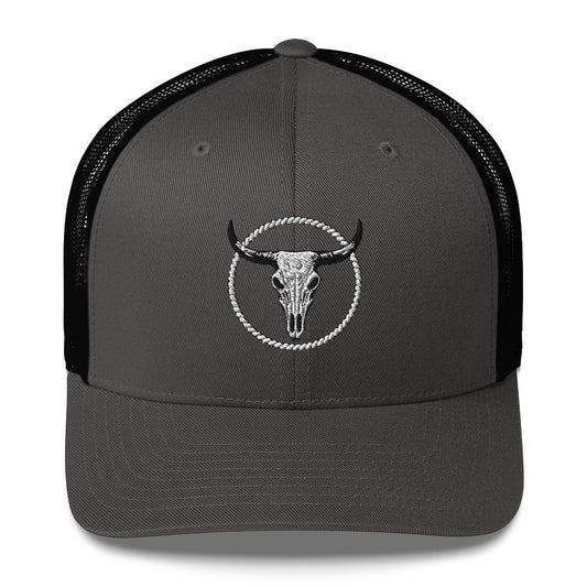 Dark gray MNTAIN Trucker hat with black mesh back and embroidered bull skull design