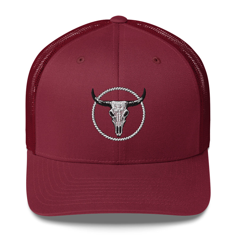Maroon MNTAIN Trucker hat with black and white bull skull embroidered emblem front