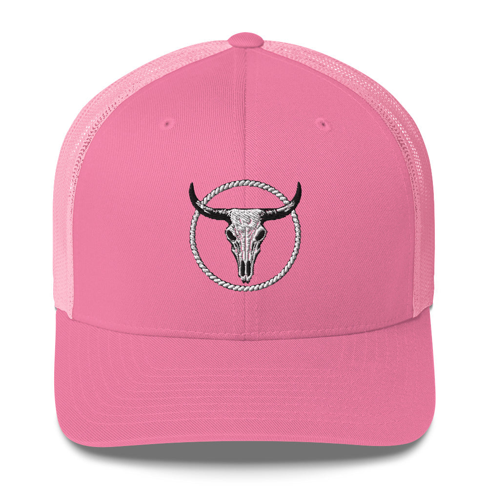 Pink MNTAIN Trucker hat with black and white bull skull embroidery on front mesh back design