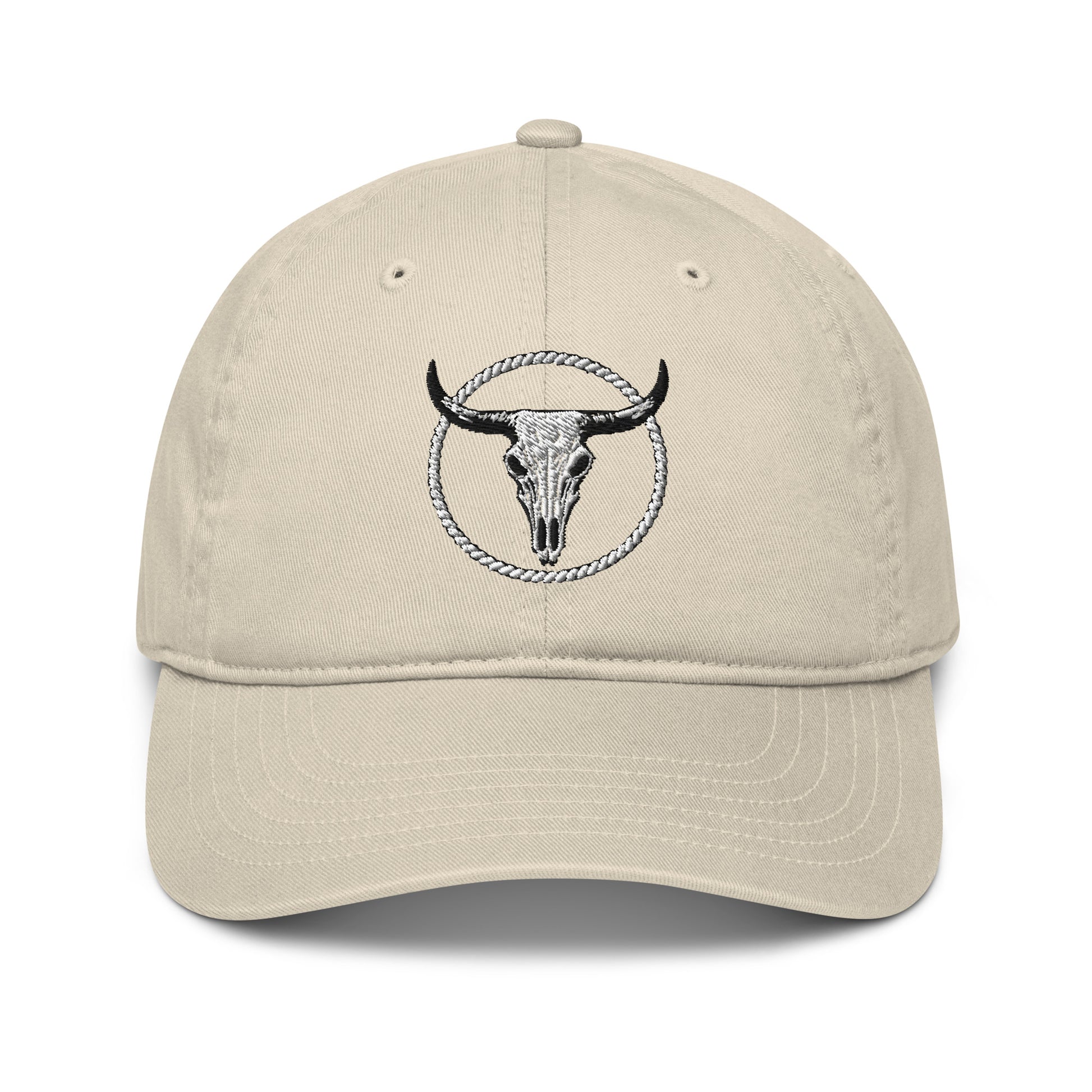 mntain outlaw beige organic dad hat with embroidered black bull skull and rope circle design