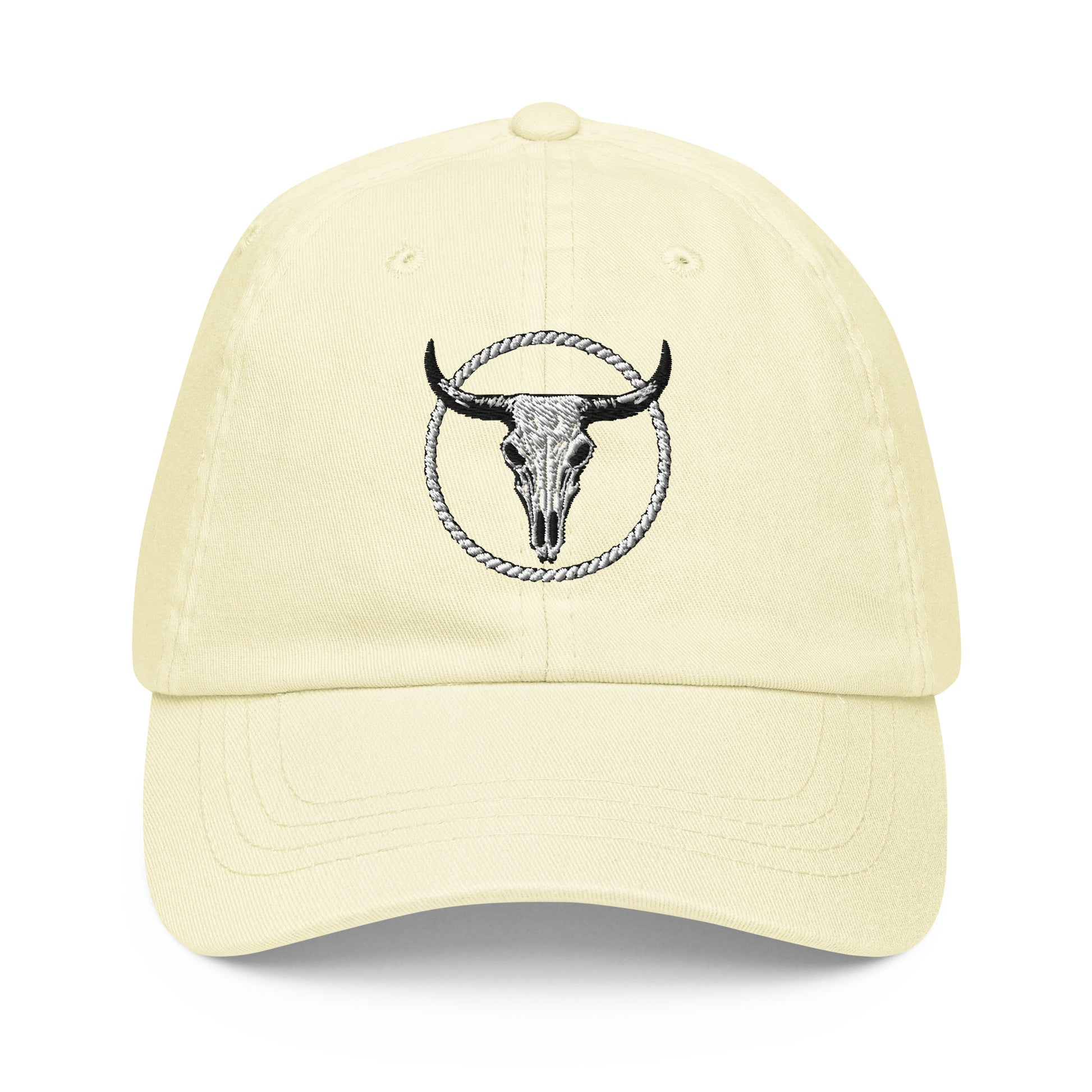 mntain outlaw pastel baseball cap with embroidered bull skull and rope design in light yellow
