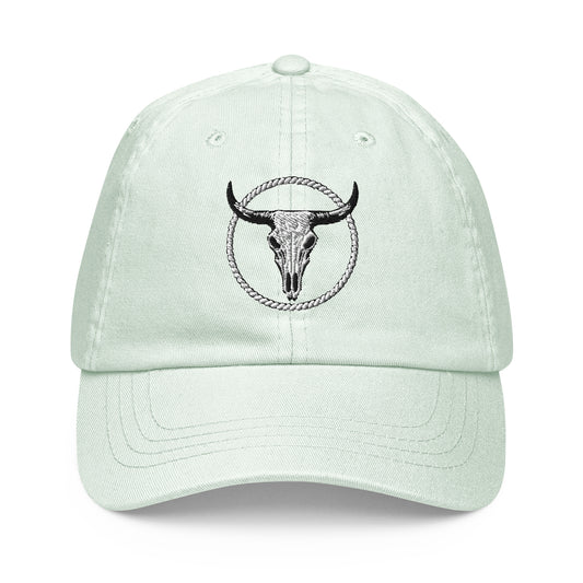 mntain outlaw pastel baseball cap with embroidered bull skull inside rope circle design