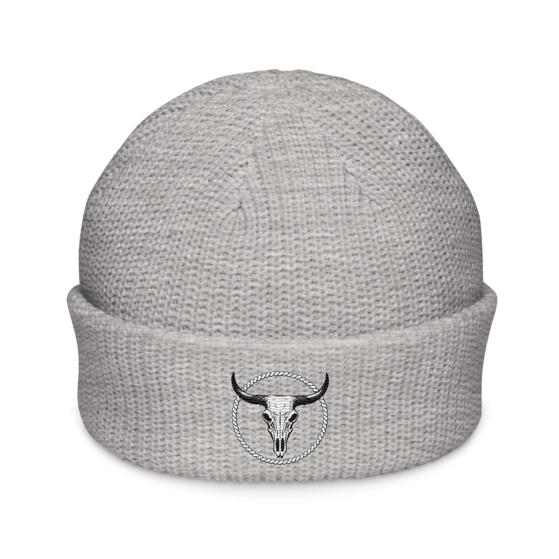 mntain rugged fisherman beanie in light gray with a black bull skull emblem on the cuff